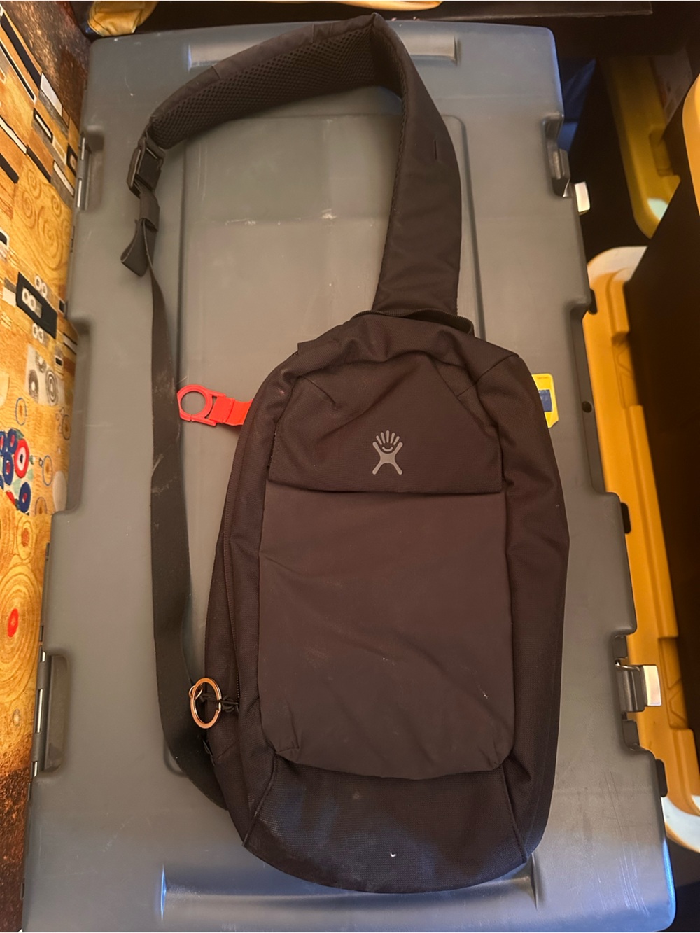Hydro Flask Black Sling Bag with Red Accent Buckle